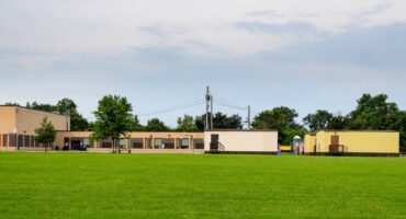 A modular classroom is an educational building constructed using pre-fabricated components which are built off-site and then assembled on location.